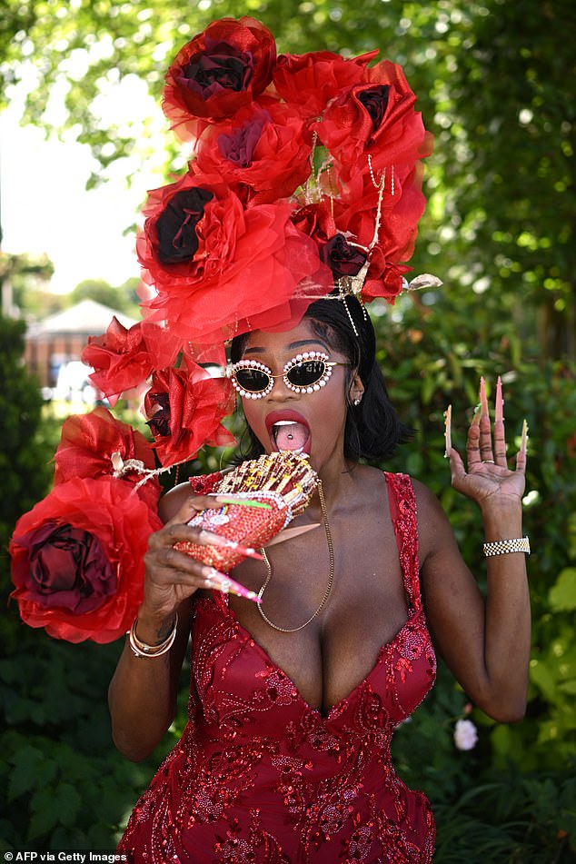 Many opted for wild and wonderful outfits for the occasion, with one woman wearing a stunning red sequin ensemble with a plunging neckline.