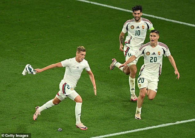 Kevin Csoboth (left) shattered any hopes Scotland had of reaching the last 16 after scoring in the 10th minute of stoppage time.