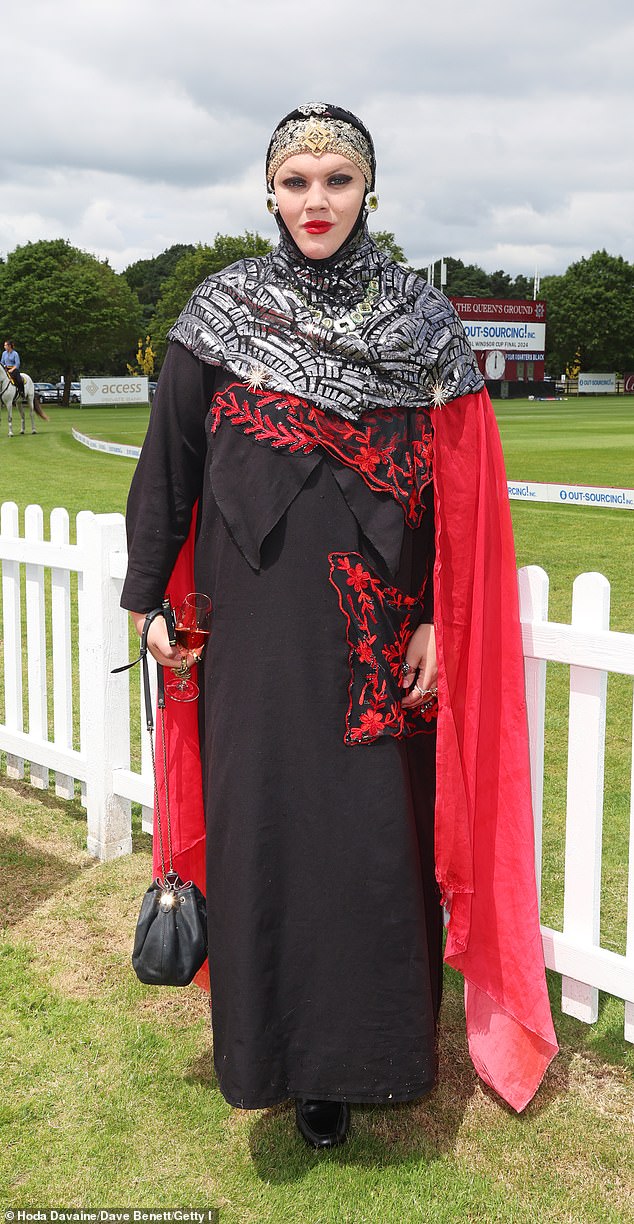 Meanwhile, Daniel turned heads in a striking black and red ensemble which he paired with a gray shawl.