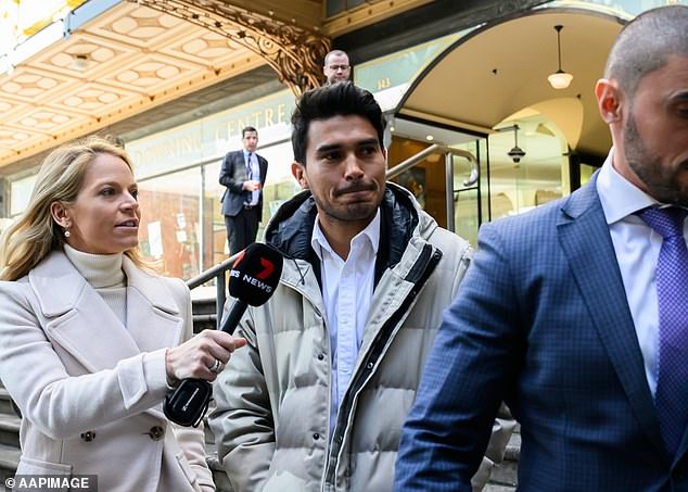 Davila (pictured center outside a Sydney pitch on Monday) is accused of paying teammates up to $10,000 to ensure they received yellow cards during matches.