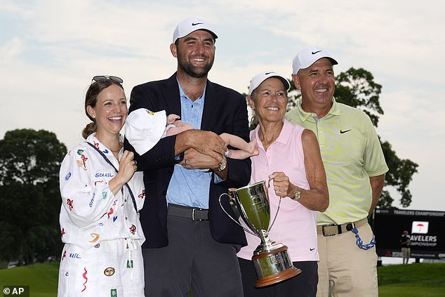 The two-time major winner is pictured with Meredith and his parents Diane and Scott.