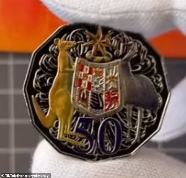 The coin has his coat of arms highlighted in stunning colors, including the state insignia on the shield.