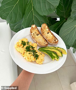 To lose weight, she reduced her daily calorie intake by 500 to lose about 500g per week (breakfast pictured).