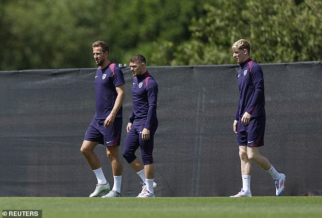 Monday's session in Blankenhain was attended by the entire 26-player England squad, including Harry Kane (left), Kieran Trippier (centre) and Anthony Gordon (right).