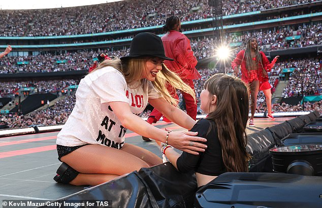 Swift was seen talking to a young woman in the audience while performing the Red Era of her show at Wembley Stadium on Saturday.