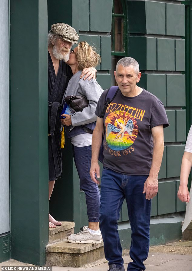 The friend outside Sir Ian McKellen's home in London yesterday after his accident.