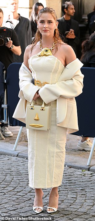 Italian model Valentina Ferragni cut an elegant figure in a strapless white dress that she paired with a matching jacket.