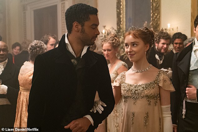 Meanwhile, Bridgerton star Phoebe, 29, had to perform several sex scenes in the steamy Netflix period drama alongside her co-star and heartthrob Rege-Jean Page (pictured together on the show).