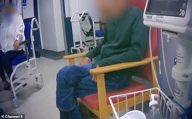 A patient waits for care in a chair as the NHS care crisis continues