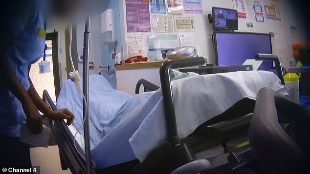 A man is forced to urinate in a bottle in the emergency room corridor in front of patients and relatives