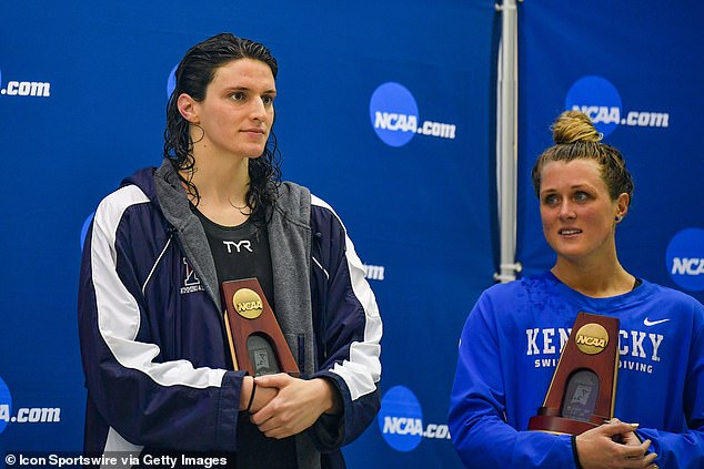 Transgender swimmer Lia Thomas (left) appears alongside Riley Gaines after finishing tied for fifth in a 200m freestyle final in Atlanta, Georgia, in March 2022.