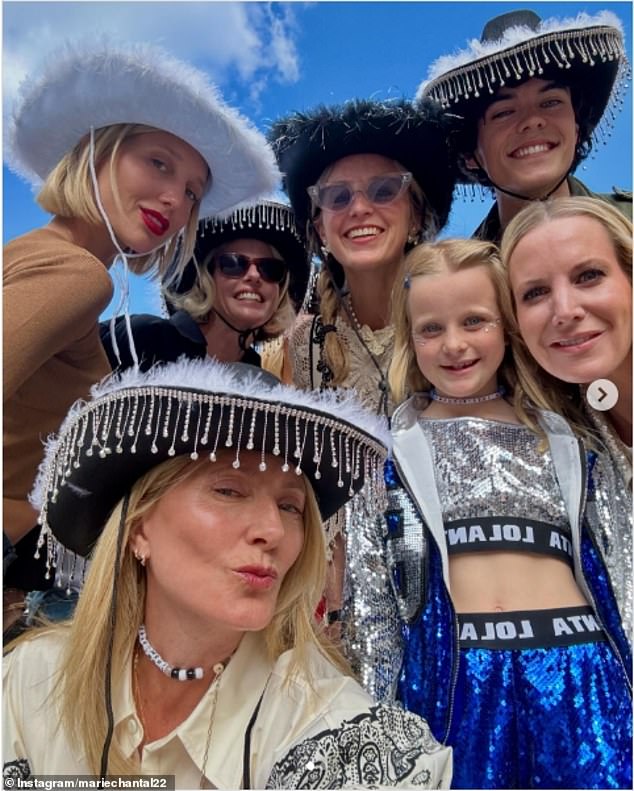 Crown Princess Marie Chantal of Greece (pictured front) shared a selfie with her family at Wembley for the concert.