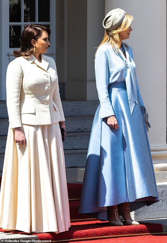 Maxima repeated a look from 2023, while Sheikha Jawaher bint Hamad Al Thani, the emir's third wife, also looked stunning in a similar silk skirt in an ivory tone.