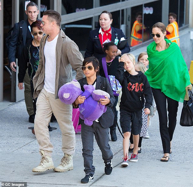 Jolie, who shares six children (Maddox, 22, Pax, 19, Zahara, 18, Shiloh, 17, and twins Knox and Vivienne, 1) with Pitt, reportedly contacted Voight in 2010; (pictured in 2014)