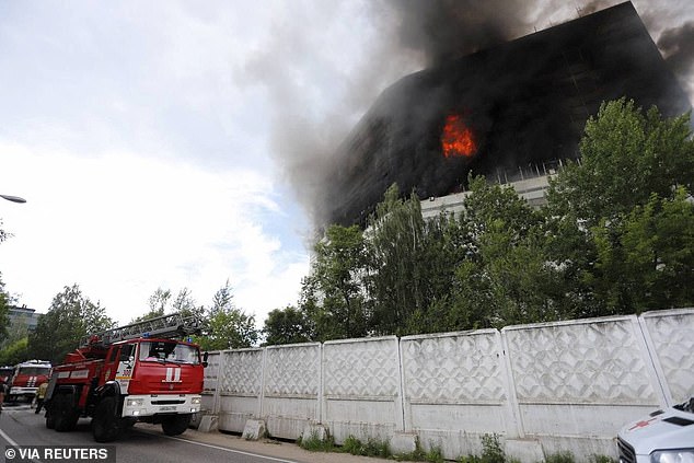 Fire and smoke rise from a burning administrative building in Fryázino, Moscow Region