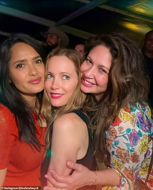 The actress, 57, took to her Instagram on Sunday to share incredible snaps and videos from her VIP experience at the pop star's Eras Tour show on June 21 at Wembley; seen with Leslie Mann, center