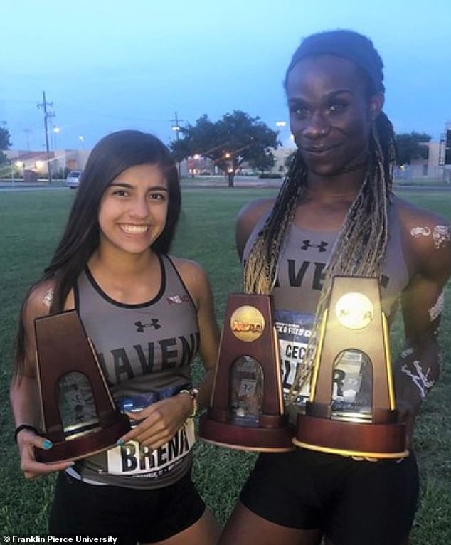 Telfer (right) pictured after winning a Division II national title in the 400-meter hurdles as a senior at Franklin Pierce University in 2019.