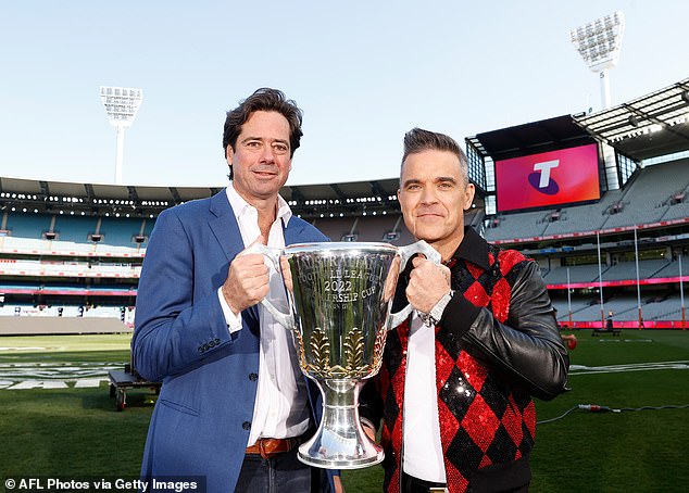 The former Take That star (pictured with former AFL chief executive Gillon McLachlan) has followed the Blues closely since putting on an impressive show in the 2022 grand final.