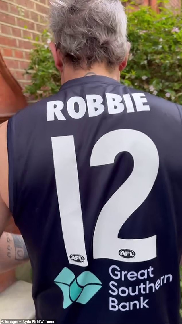 He made sure to wear a strip with his name on the back (pictured) to give bewildered fans an idea of ​​who they were looking at.