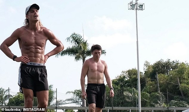 Smith (pictured left during a training session) is known for being one of the hardest workers in the AFL, both on and off the field.