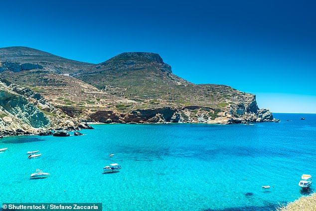 Harriet likes to swim in the bright turquoise waters. Above, Agail beach