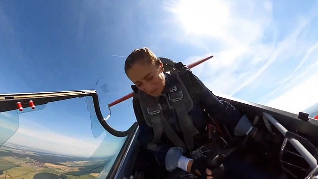 Nadine struggled to keep her eyes open during the chaotic flight as the wind hit her face as she soared through the air.