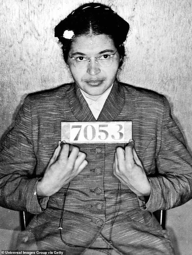 Pictured: American civil rights activist Rosa Parks after being arrested for refusing to give up her seat on the bus in 1955.