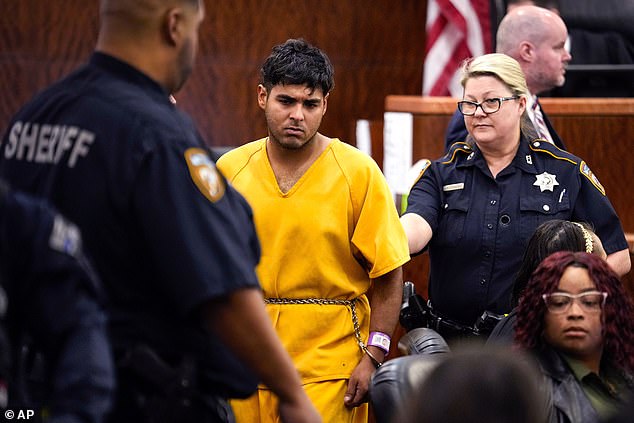 Johan José Rangel-Martínez, 21, one of two men accused of killing 12-year-old Jocelyn Nungaray, is led out of the courtroom by officers on Tuesday.