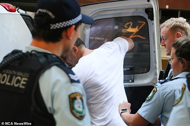 An angry Roberts banged on the window of the vehicle (pictured) as it was being taken away.