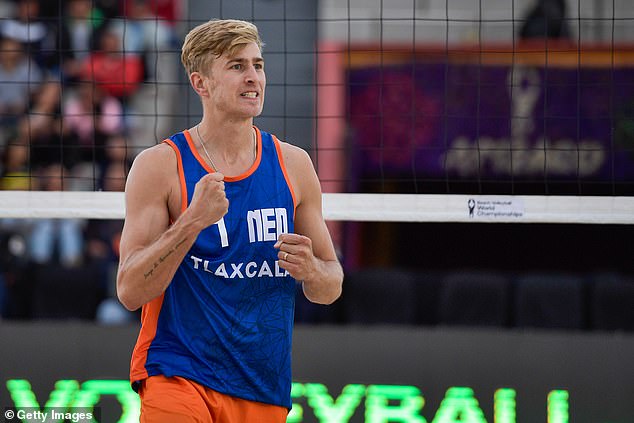 Van de Velde celebrates during a match on day 6 of the 2023 World Beach Championships