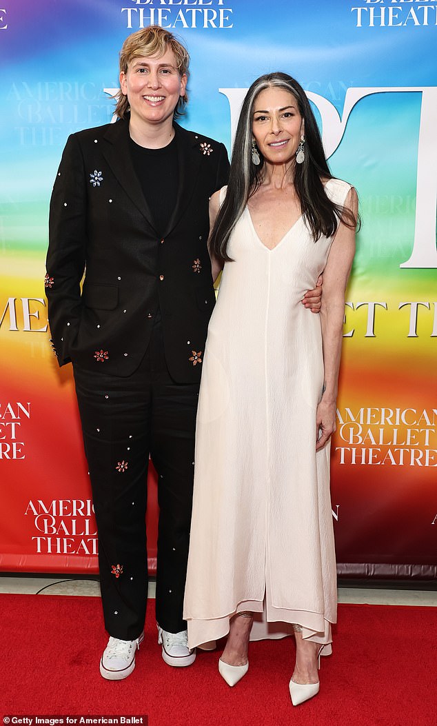 London was accompanied at the premiere by her partner Cat Yezbak, who wore a black pantsuit with floral stone details.