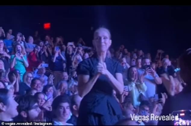 He wasted no time in standing to give the musician a standing ovation, along with other members of the audience.