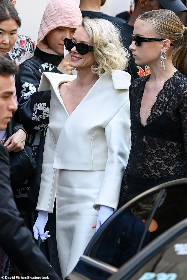 The mother-son duo looked radiant with Naomi sporting a chic white suit ensemble consisting of an off-the-shoulder jacket and pencil skirt.