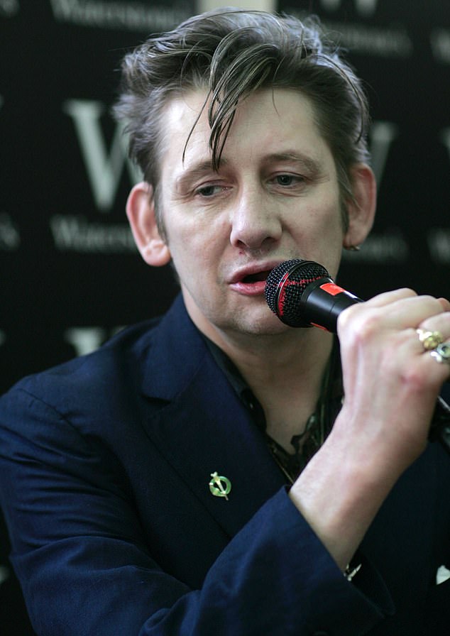 Pictured: Shane MacGowan singing at a Waterstones in June 2007, where his partner Victoria Mary Clarke was reading her book.