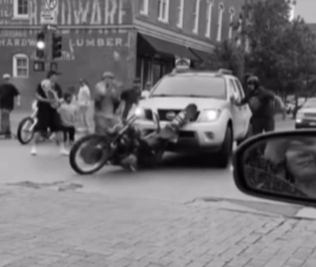 While most spectators seemed to side with the truck driver, skaters participating in the parade slammed their boards against the bumper of the truck in anger.