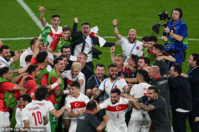 When tensions calmed down, the Turkish team celebrated its passage to the round of 16, where it will face Austria.