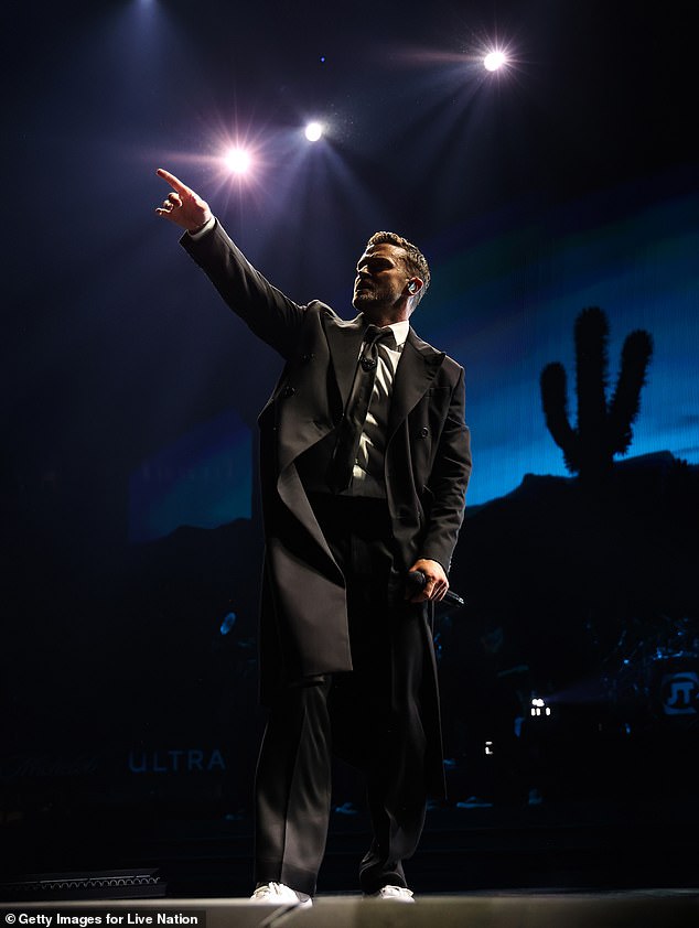 Justin appeared to be in a green room at Madison Square Garden, where he was scheduled to perform Wednesday night; photographed on tuesday in the sand