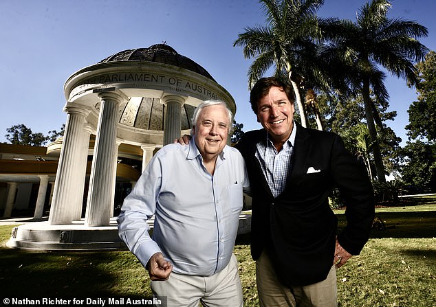 Carlson was invited to the Australian Freedom Conference by mining billionaire Clive Palmer (both pictured ahead of his nationwide speaking tour)