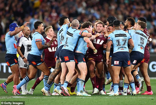 Football fans were left stunned as two players were sent off the pitch following the incident.