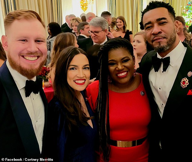 Bush and her husband Cortney Merritts at an event with other Democrats