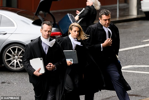 Pictured: Matthew Collins KC, Zoe Graus and Tim Senior outside the Federal Court in May