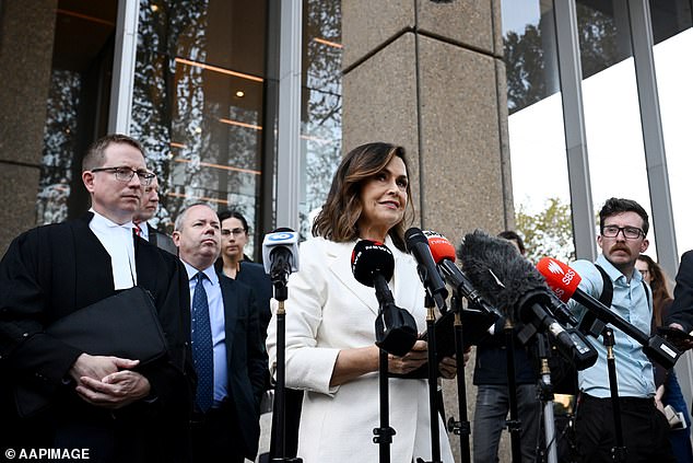 Lisa Wilkinson is pictured speaking to the media after her libel victory in April.