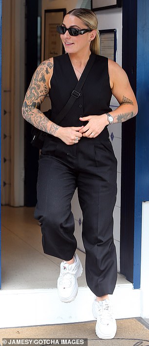 Simon joined former X Factor star and friend Lucy Spraggan at lunch, just weeks after walking her down the aisle at her wedding to wife Emilia Smith.