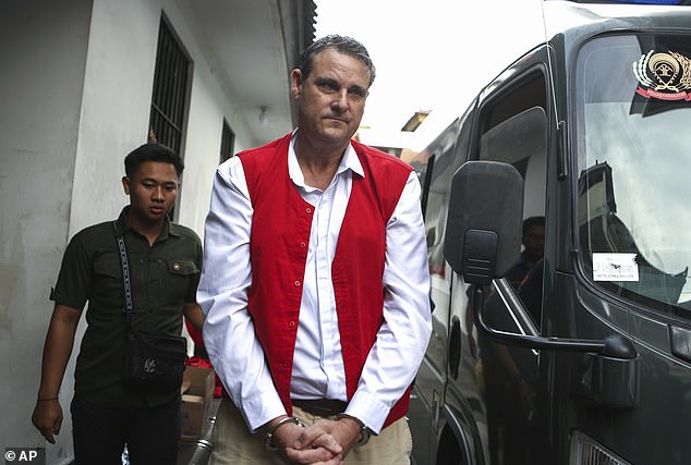 Australian father-of-two Troy Smith is pictured next to a prison van in Bali on Thursday.