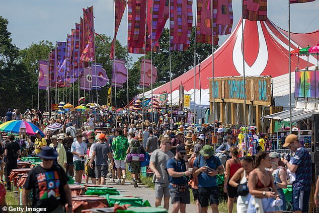 Drug testing at festivals is part of an approach known as harm reduction. Organizers and police will try to prevent drugs from entering, but most agree that it is almost impossible to prevent this from happening. Pictured are people walking around the site yesterday during the first day of Glastonbury.