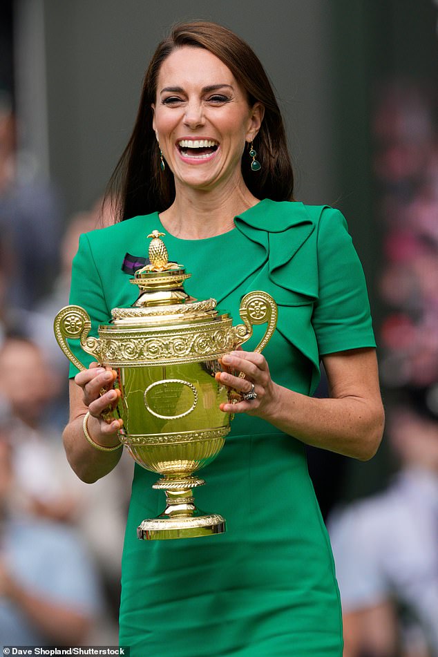 Kate presenting the Gentlemen's Singles trophy at Wimbledon last year. She traditionally presents the trophies each year, as well as attending several matches during the tournament.