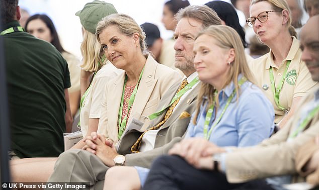 The mother of two smiled in agreement as she listened intently to other speakers during the seminar.