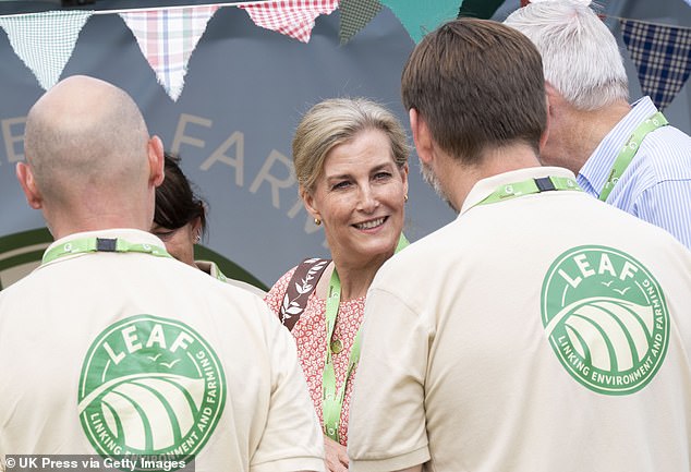 Sophie wore a cheerful smile as she exchanged conversation with some of the festival staff.