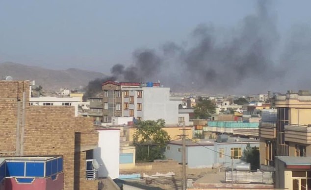 Smoke rises over Kabul after explosion that killed 13 US soldiers and 90 Afghans