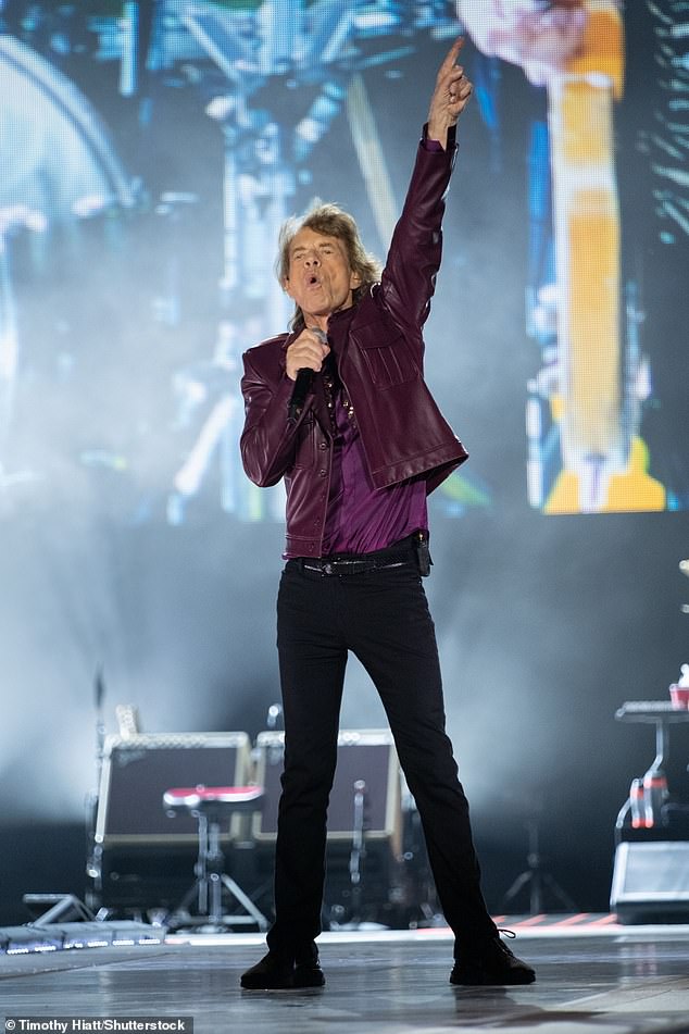 Sir Mick Jagger, 80 (pictured), put on a typically energetic display when he was joined by guitarist Keith Richards, 80, and bassist Ronnie Wood, 77, on Thursday night.